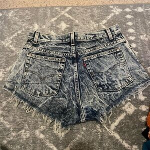 Vintage Acid Wash Levi 550 cutoff denim shorts
